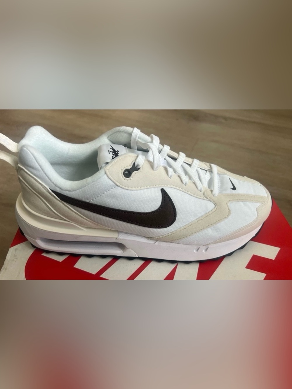 Nike White Sneaker with Dark Brown Swoosh and Cream Accents